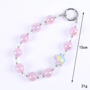 Pink cat eye beaded phone strap with resin star charm and 15cm length measurement