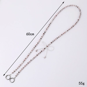 Cordón de cuentas rosas jaspeadas con lazo de cristal y longitud de 60cm