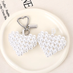 Handmade pearl woven heart charm with Good Luck metal tag for bag or phone decoration