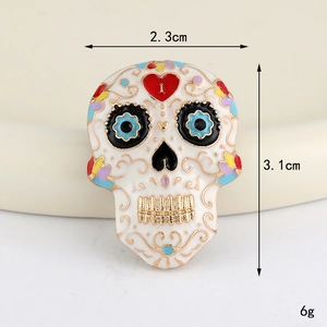 Detail of Sugar Skull charm with heart eyes measuring 2.3cm by 3.1cm for DIY jewelry