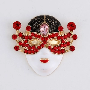 Vintage Venetian masquerade mask brooch with red rhinestones and black enamel detail