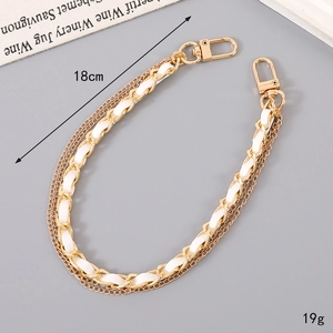 Golden bimetal chain with white woven leather strap and dual lobster clasps, length 18cm