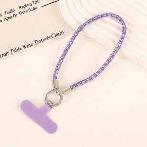 Luxurious purple rhinestone phone wrist strap with a matching T-shaped insert pad