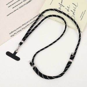 Detail of hand-woven black and white phone lanyard with silver metal swivel hooks