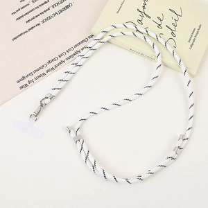 Detail of durable black and white braided crossbody phone lanyard with silver metal hook