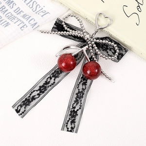 Fashionable cherry bag charm with red glitter fruits and black lace ribbon bow