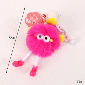 Porte-clés monstre en peluche fuchsia avec de longues jambes et une chaîne rose, 15cm