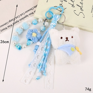 Plush blue and white bear keychain with star accents and beaded charm strap, length 26cm