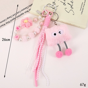 Pink plush monster keychain with pearl charms and lace ribbon, 26cm cute bag accessory