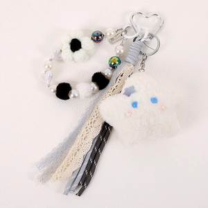 Cute plush star keychain with colorful beads, crochet flower and Good Luck metal tag