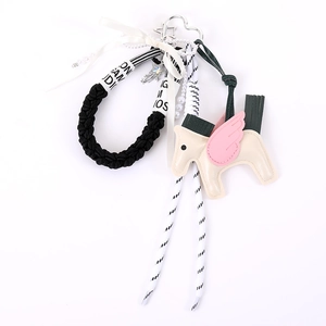 Handmade PU leather pegasus bag charm with woven rope lanyard and heart metal clasp