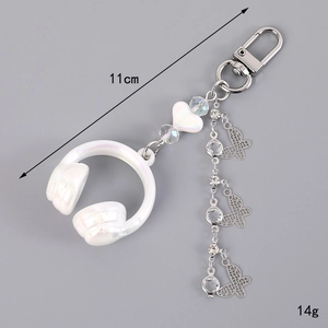 Stereo music headphone keychain with pearl luster beads and metallic butterfly tassels