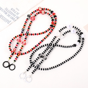 Chic beaded phone lanyard with cute bear and letter charms in colorful and black-white styles
