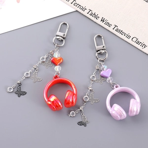 Creative headphone keychain with butterfly charms and shiny rhinestones for women