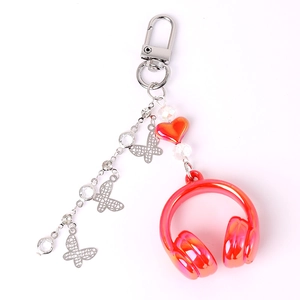 Creative headphone keychain with butterfly pendant and red heart beads for bags