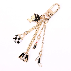 Fashion alloy keychain with enamel charms featuring high heels, lipstick and clothing