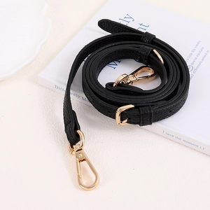 Adjustable black lychee leather bag strap with gold metal swivel hooks and buckles