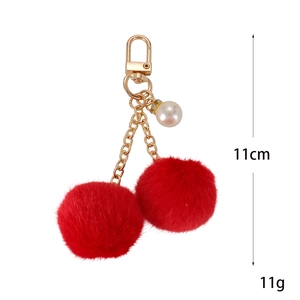Plush red cherry keychain with gold spring clasp, faux pearl pendant and 11cm long design