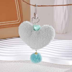 Green plush heart charm with mint bead and blue pom pom for bags and phones