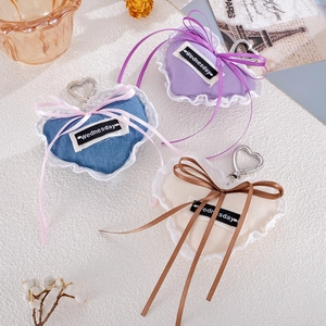 Handmade denim heart keychain with lace edge and ribbon bow for bags and phones