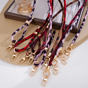 Leopard print plush phone lanyards with gold metal clasps in various stylish colors