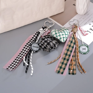 Retro houndstooth heart bag charms with woven rope and round chip charms in two colors