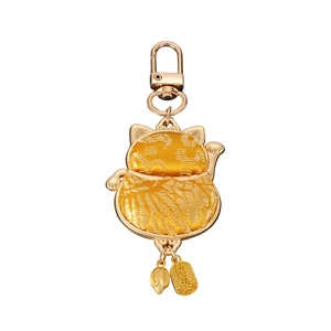 Golden Chinese Maneki Neko keychain with traditional embroidery and Lucky Cat charm