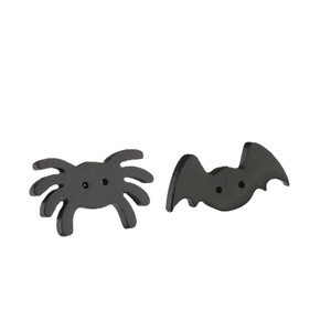 Punk style black spider and bat stud earrings for Halloween accessories on white backdrop