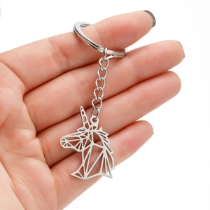 Geometric stainless steel unicorn keychain featuring a minimalist hollow pendant design