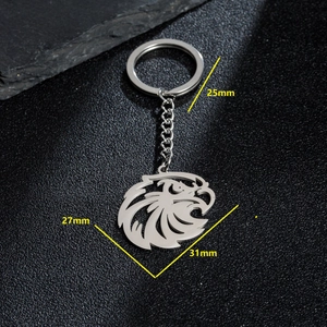 Eagle head metal keychain with polished silver finish and detailed cutout design