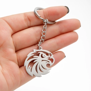 Polished stainless steel eagle head keychain pendant with a classic silver metal ring