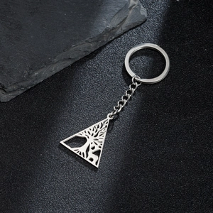 Silver stainless steel tree of life pendant keychain with a sleek minimalist design