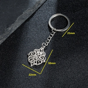 Minimalist stainless steel keychain with hollow flower mushroom pendant and 25mm ring