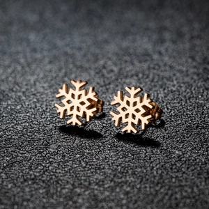 Pendientes de copo de nieve de acero inoxidable en elegante acabado oro rosa