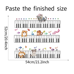 Detailed view of cartoon cat piano wall sticker with measurements of 52cm by 54cm