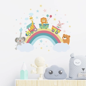 Nursery wall sticker showing a cartoon train with animals on a colorful rainbow bridge