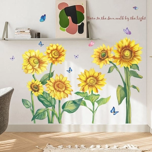 Detail of sunflower and butterfly wall decals with positive quotes for home decor