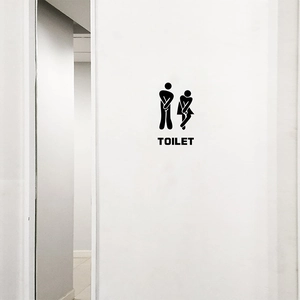 Creative toilet wall sticker featuring humorous silhouettes and bold TOILET lettering