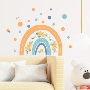 Detailed view of colorful rainbow wall stickers with flowers and dots in modern living room