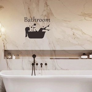 Black adhesive bathroom wall decal with figure in bathtub silhouette and text