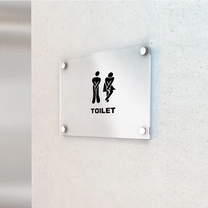 Minimalist acrylic toilet sign with humorous male and female figures for wall decor