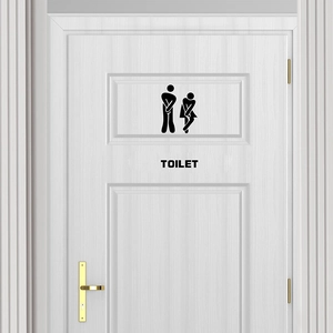 Creative funny toilet door sticker with male and female figures on white wooden door