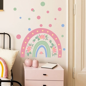 Detail of cartoon rainbow flower wall decals in a cozy bedroom with Morandi dots stickers