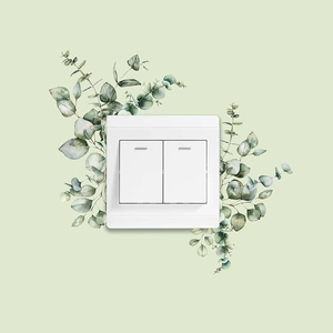 Modern white double light switch sticker with minimalist green leaf decorative design