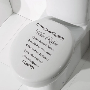 Self-adhesive Toilet Rules wall decal with black vintage lettering on white ceramic lid