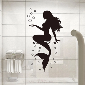 Black mermaid silhouette wall sticker with bubbles on white marble bathroom tiles