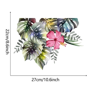 Detailed view of tropical monstera leaf and pink hibiscus sticker with dimensions