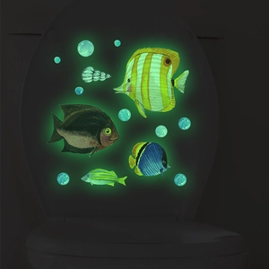 Luminous ocean fish wall stickers showing glowing bubbles and tropical sea creatures