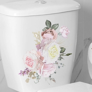 Watercolor tropical leaf and pink rose self-adhesive wall stickers on a white toilet tank