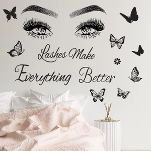 Close-up of Lashes Make Everything Better wall decal with butterfly and eye details